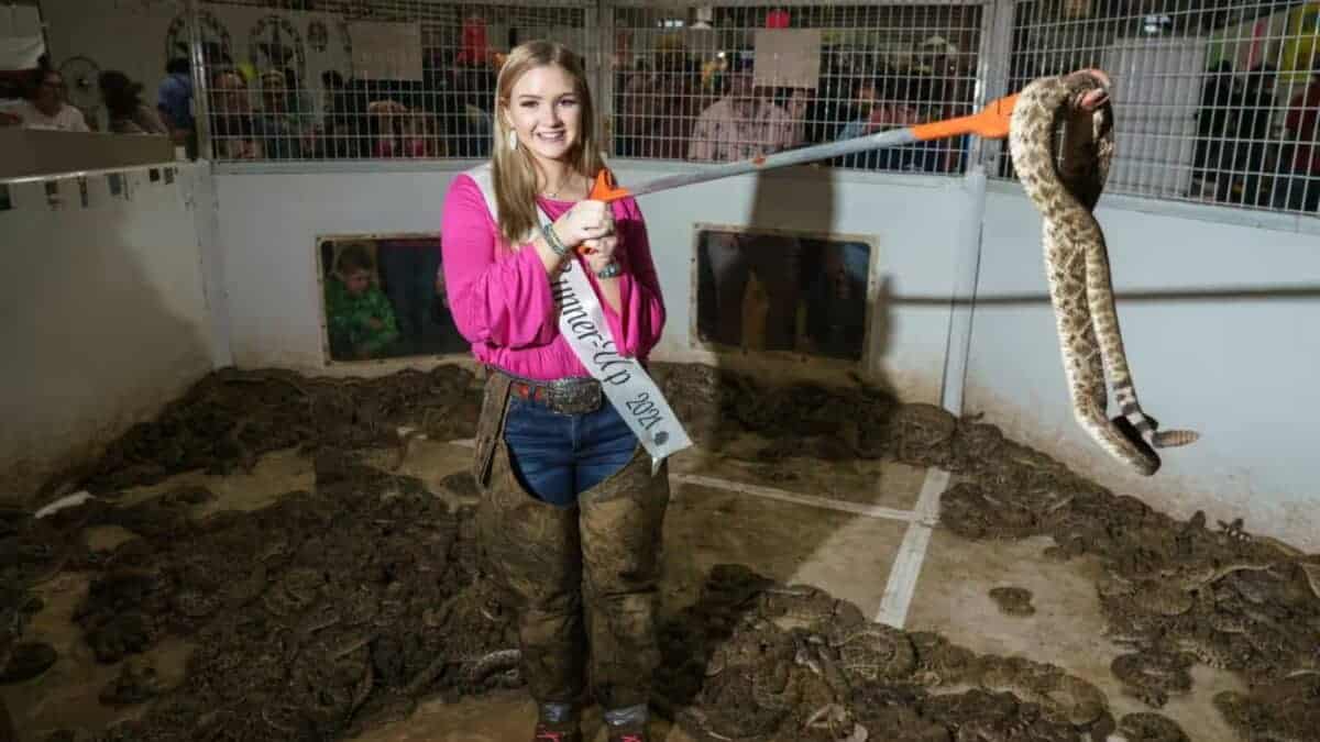 girl holding snake
