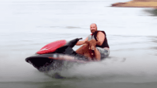 Watch Baby Cow Insists On Jet Skiing With His Dad