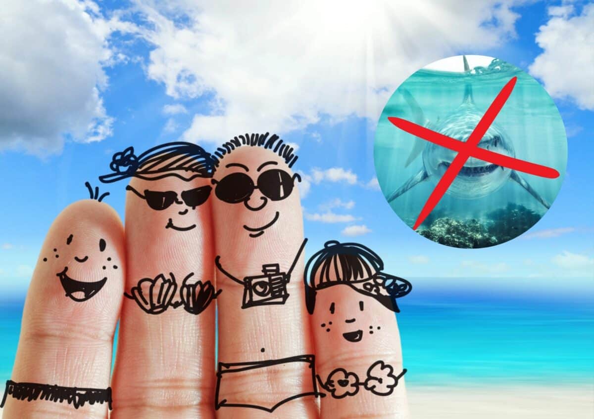 Lustige Figurenzeichnung auf dem Finger mit Strandhintergrund.