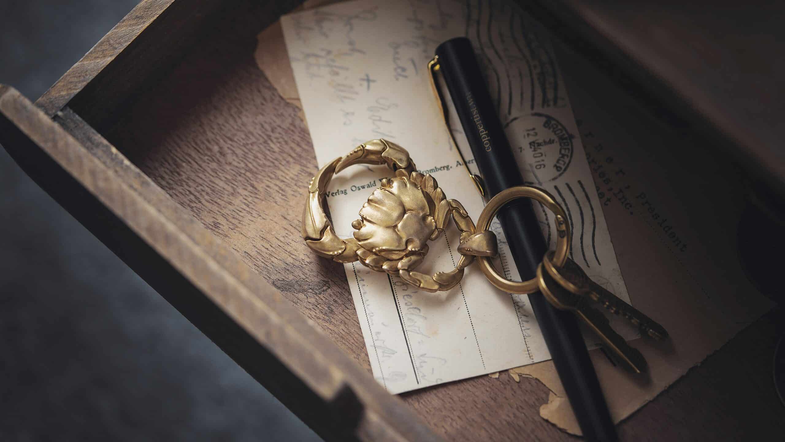 Pen and Handmade Keychain in Drawer.