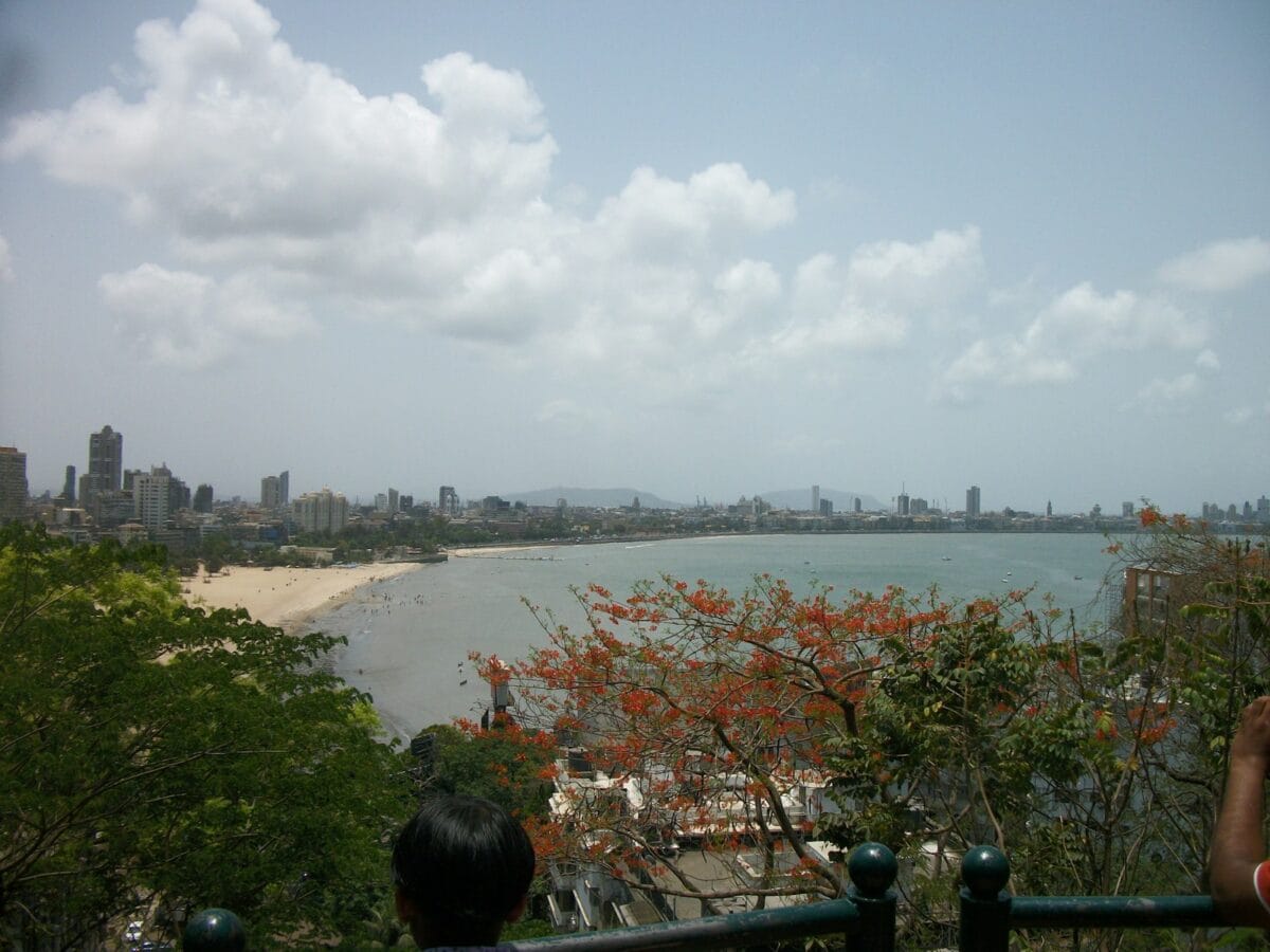 A couple of people that are looking at the water