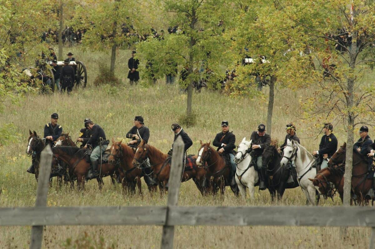 lined people riding horse
