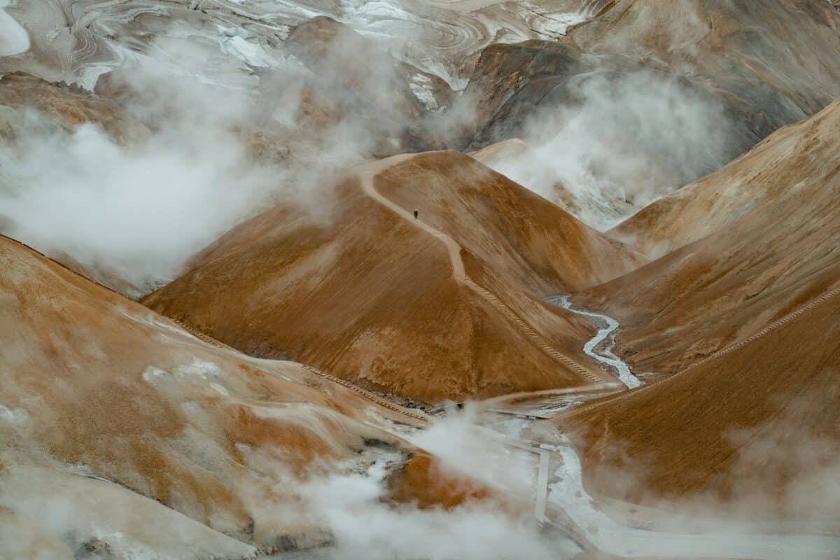 A view of a mountain range covered in clouds