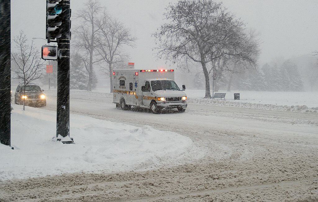 (December 20, 2006 Denver, Colorado) - Plows work to keep street passable as a  blizzard  hits Denver with up to 28 inches of snow perdicted.