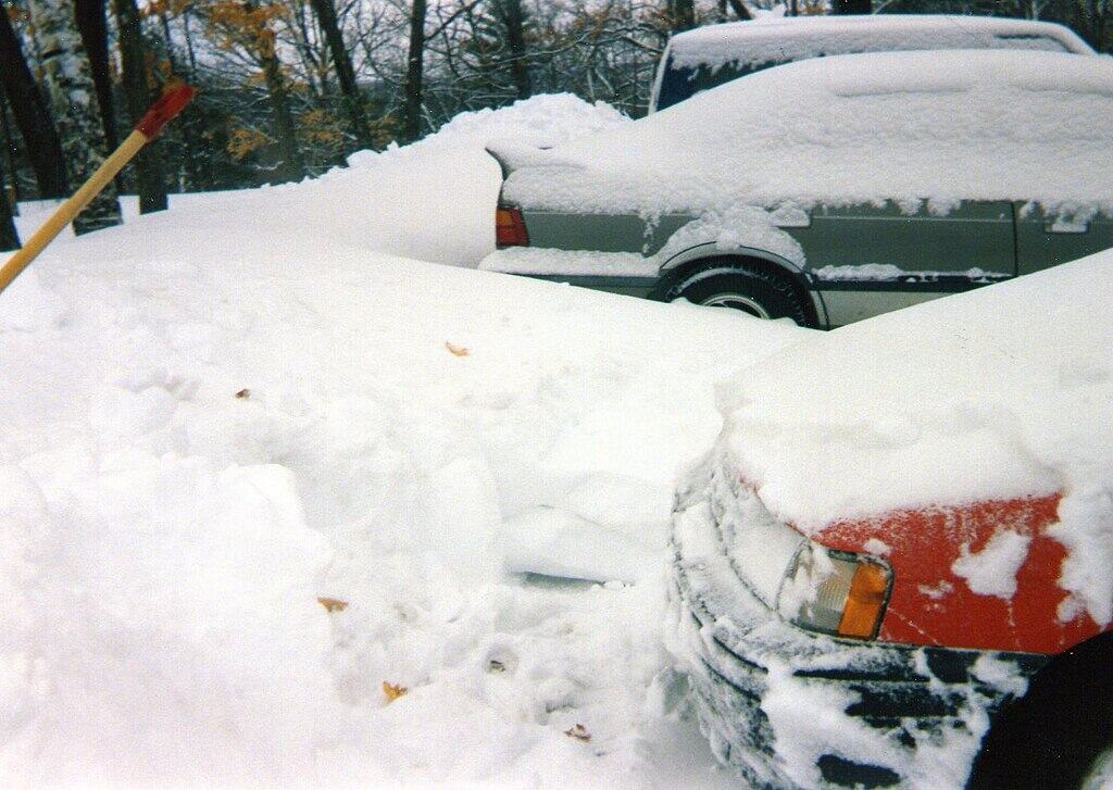 Image of a 1992 Toyota Tercel partially dug out after the Superstorm of 1993 at Fort Devens Massachusetts
