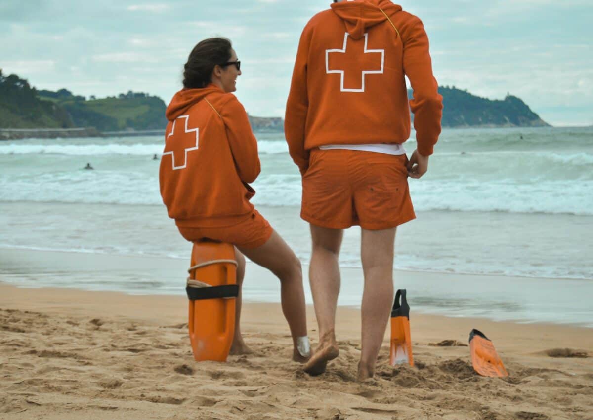 Lifeguards standing on beach 