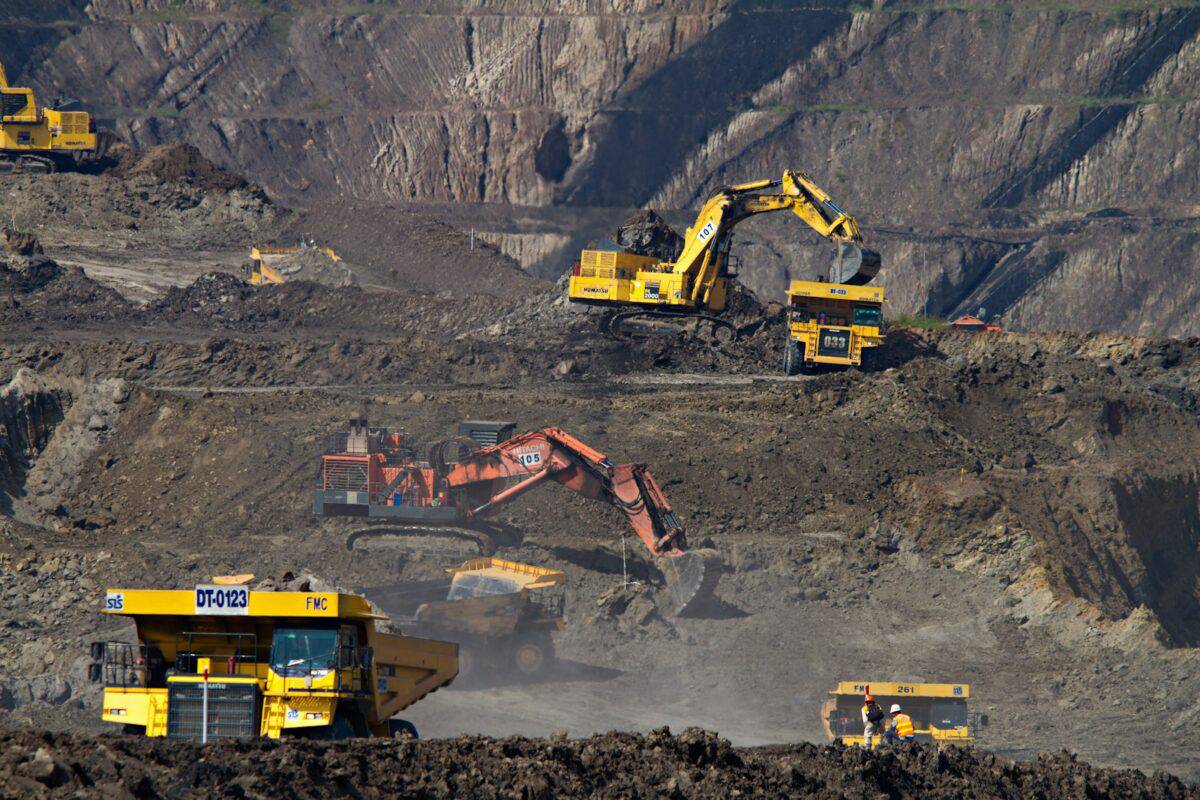 photography of excavators at a mining area