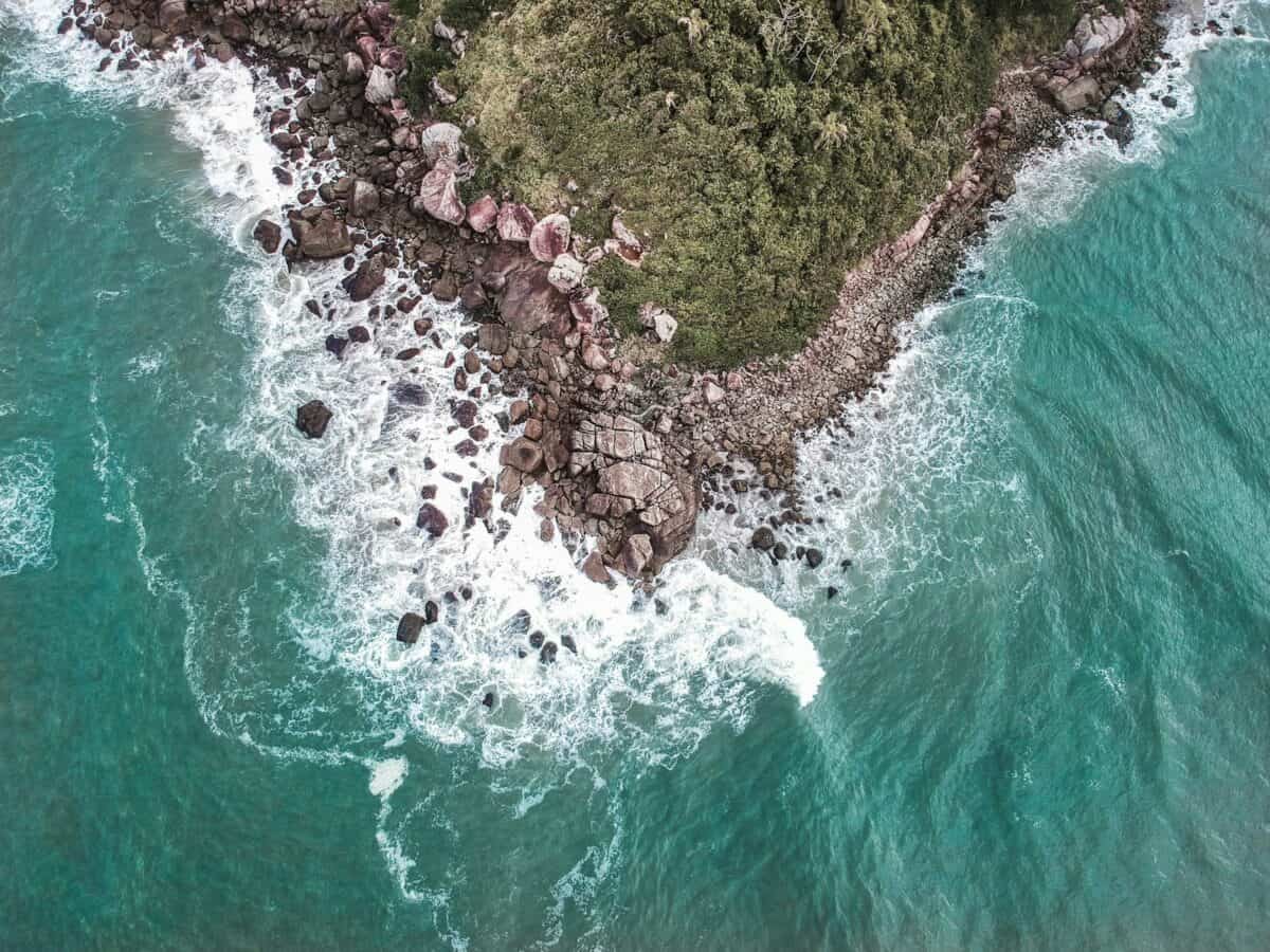 aerial view of rocks on shore