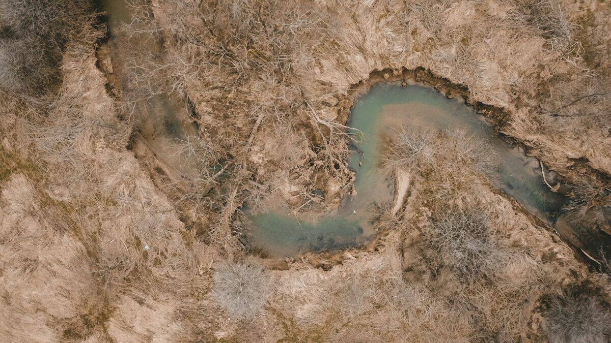 aerial photography of body of water and land