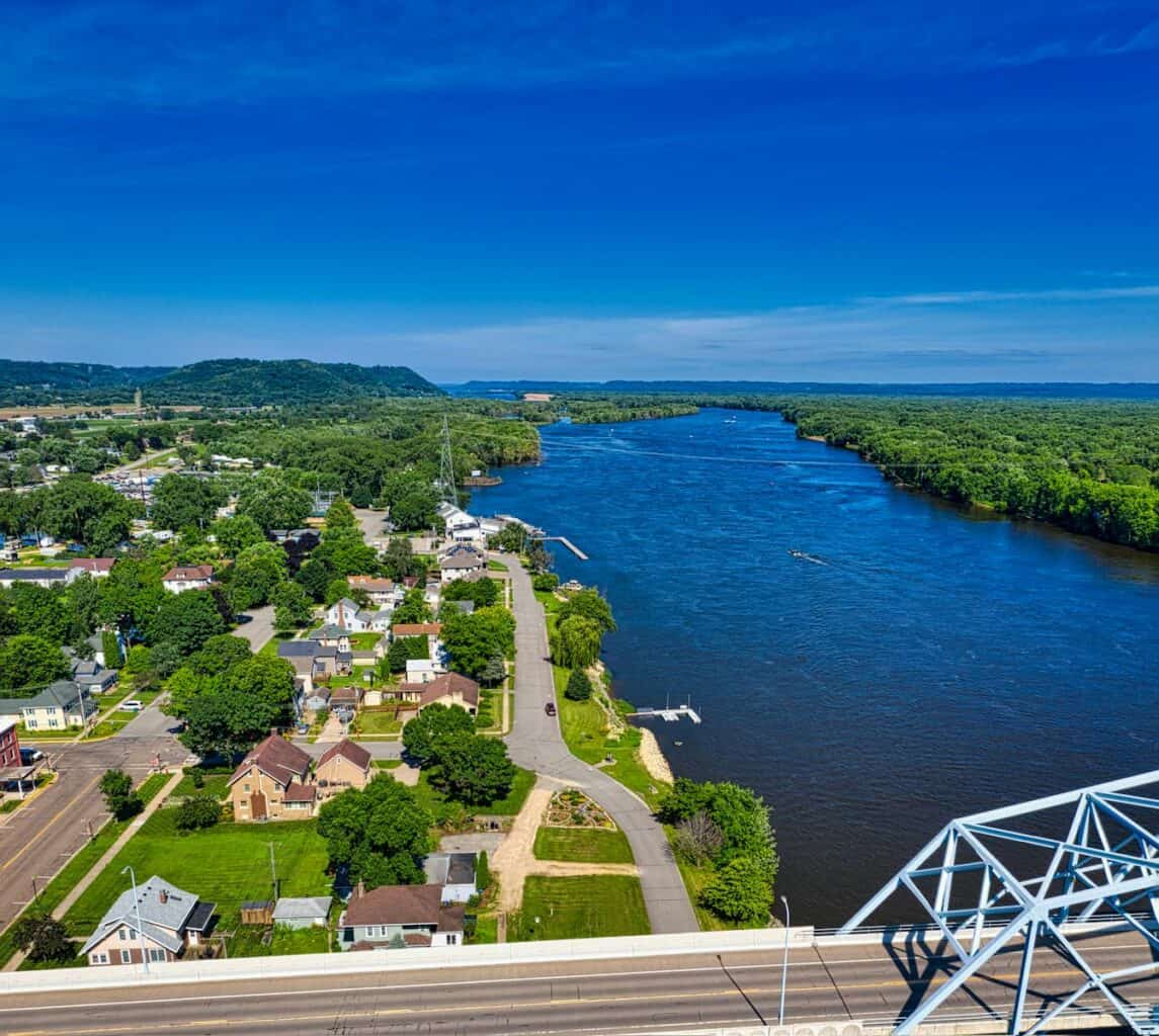 Explore the scenic aerial view of Wabasha, MN by the Mississippi River, showcasing nature and architecture.