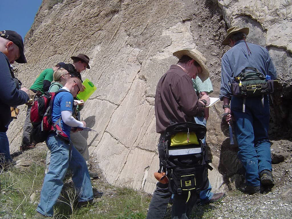 Students look at a section of the exposed Wasatch Fault, a classic normal fault located in North Salt Lake, Utah.