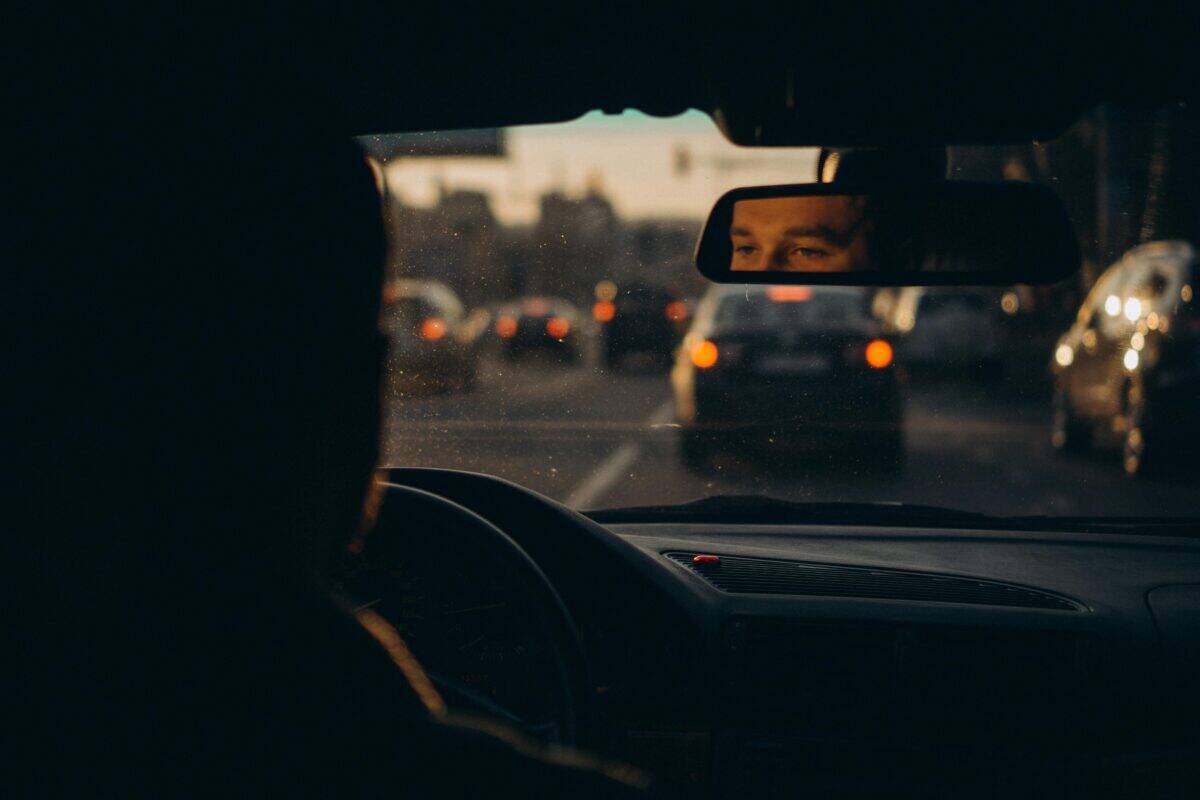 A motorist stuck in a traffic jam.