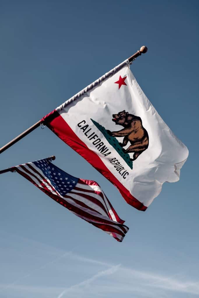 us a flag under blue sky during daytime