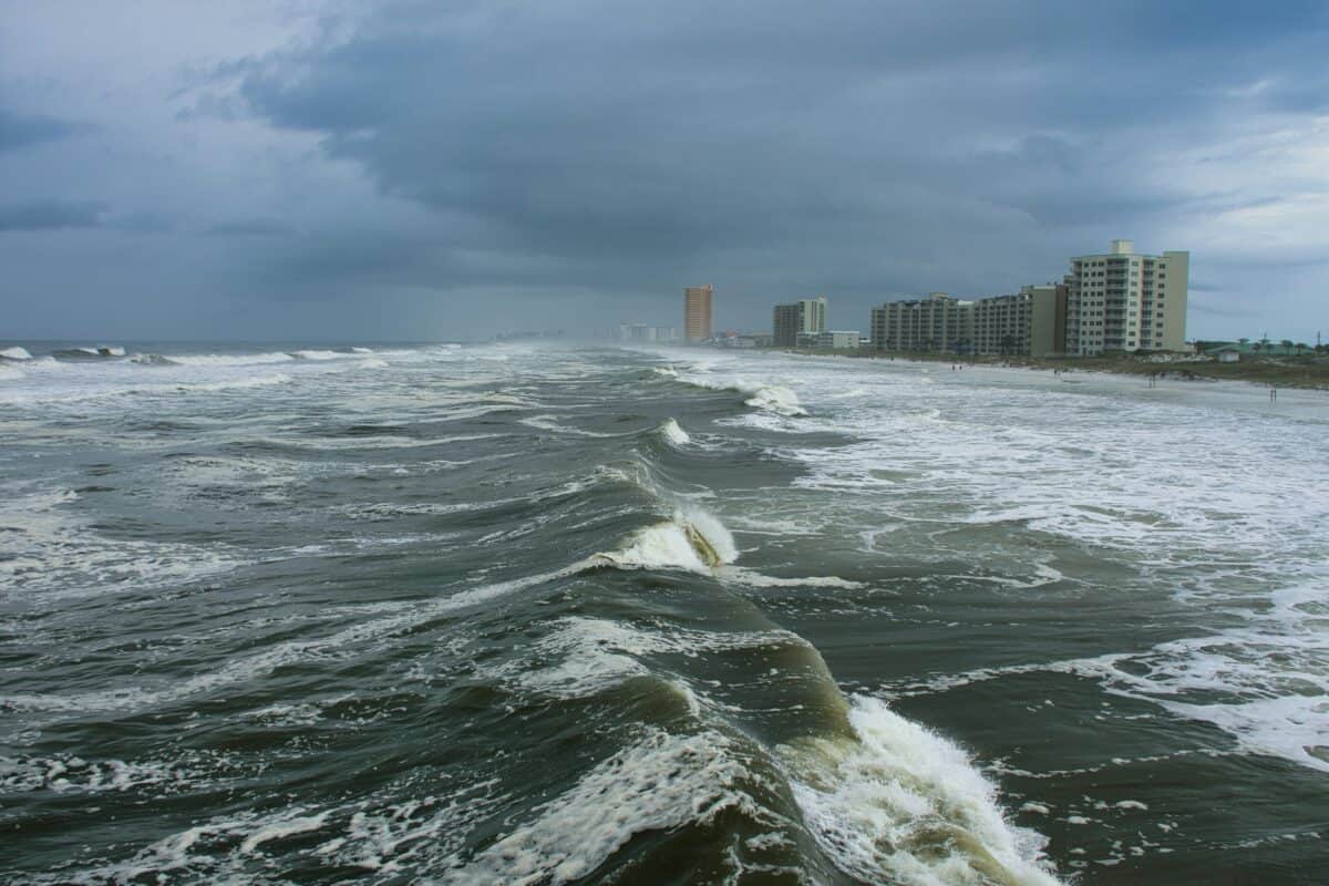 Strong waves caused by bad weather.