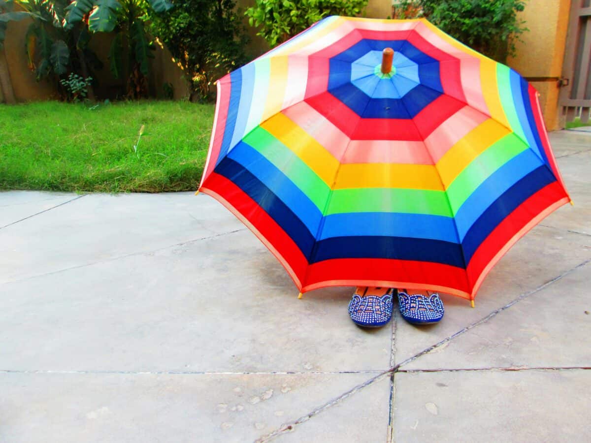 A widely opened colorful umbrella.
