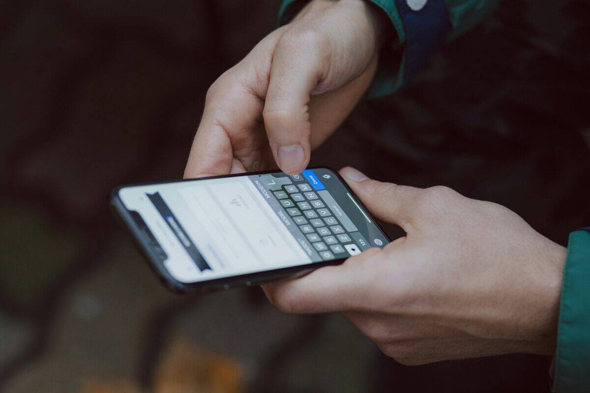 A person using a phone.