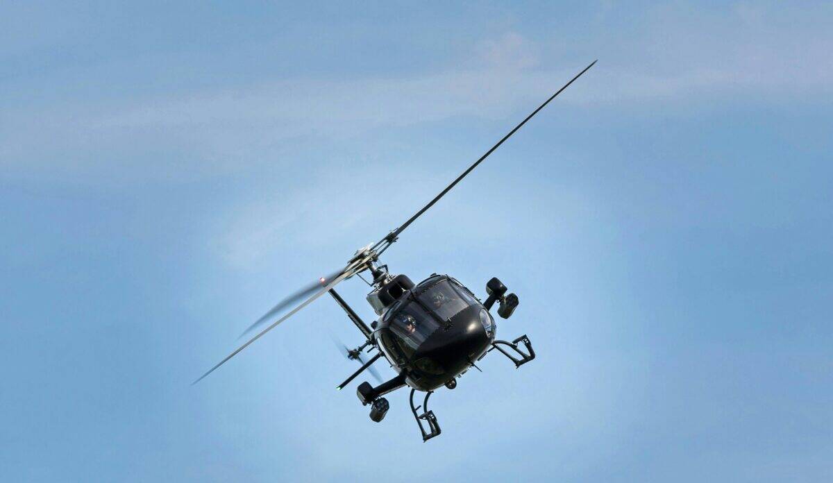 A helicopter flying in the sky.