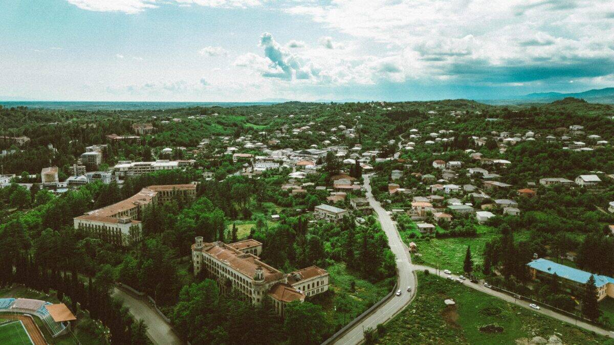 A town with a suburban wildlife setting.