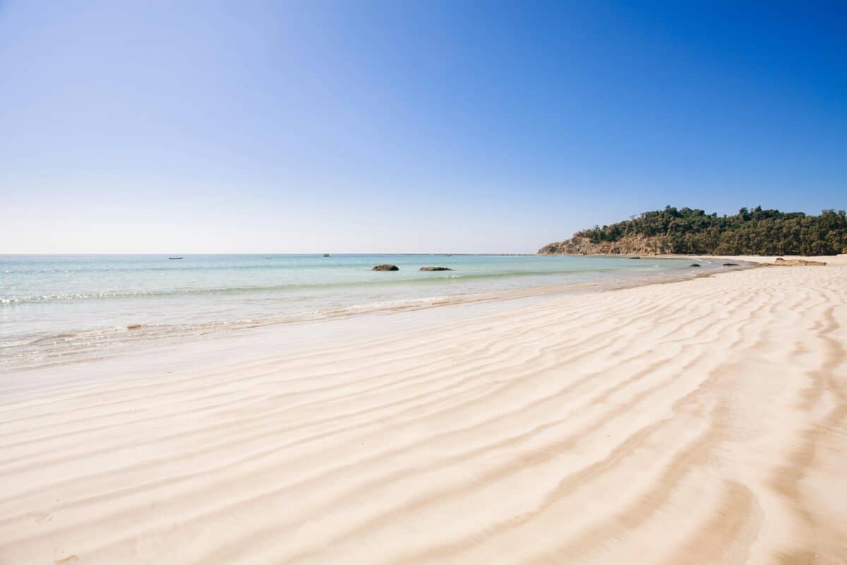 A beautiful view of a white sand beach.