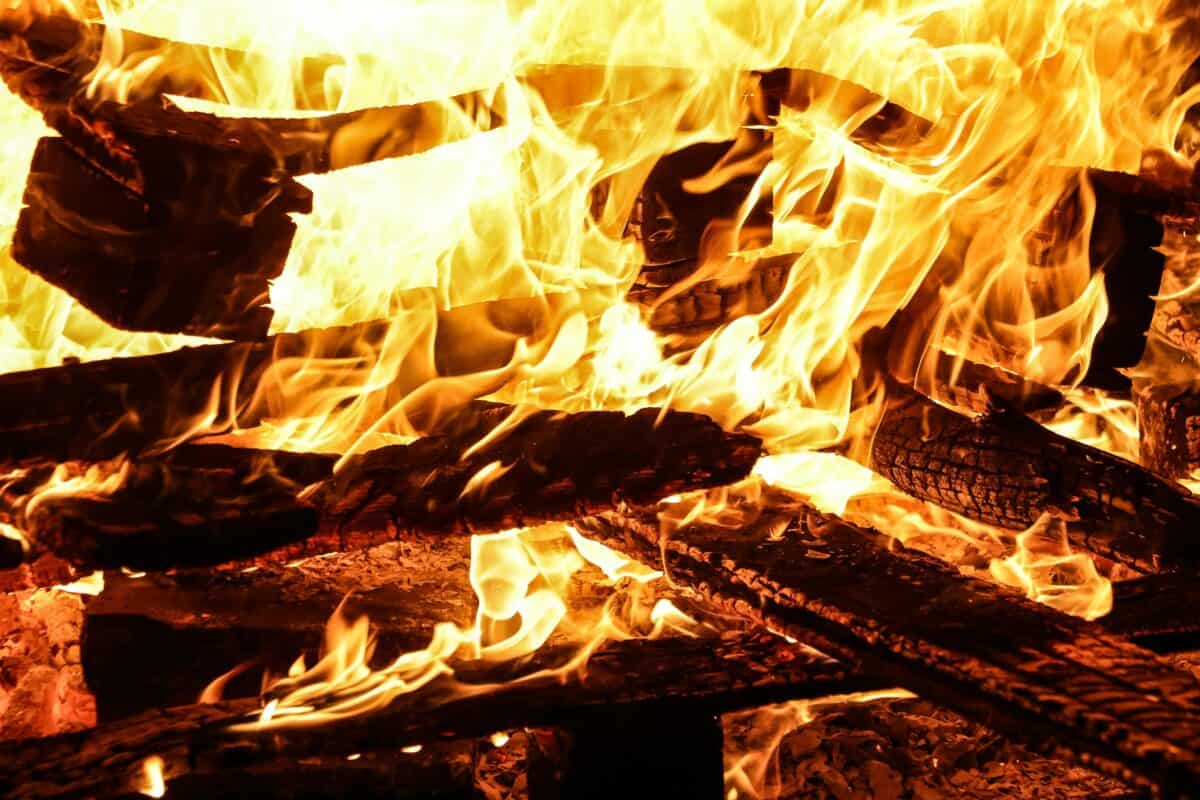 A fiery hot furnace emitting a lot of smoke.