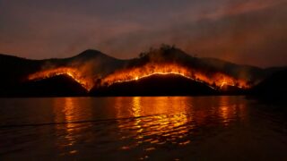 A severe wildfire at nighttime.