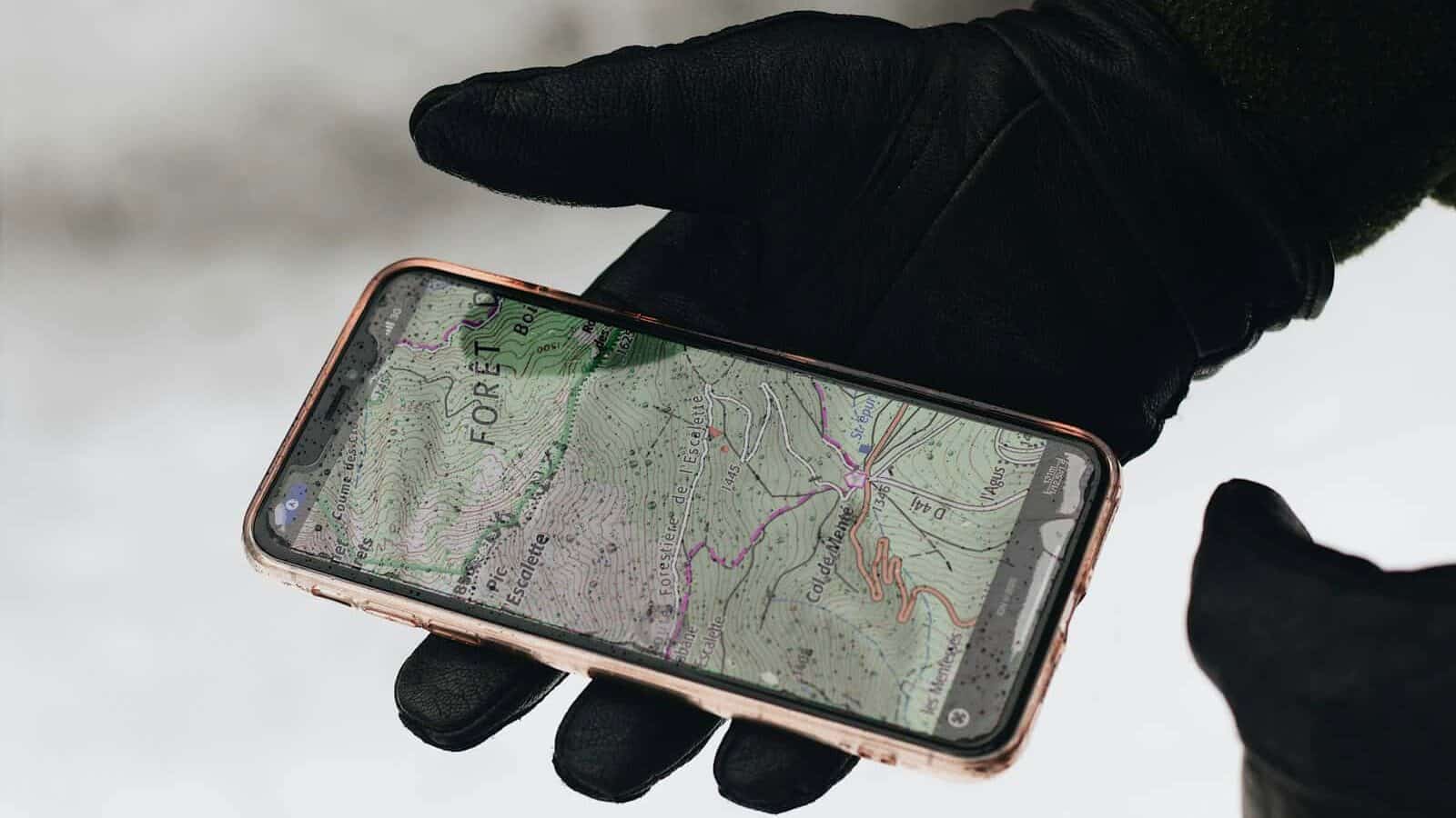 person holding iphone 6 with case