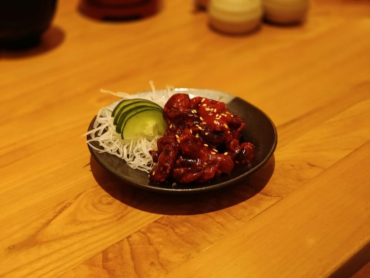 A plate of food on a wooden table