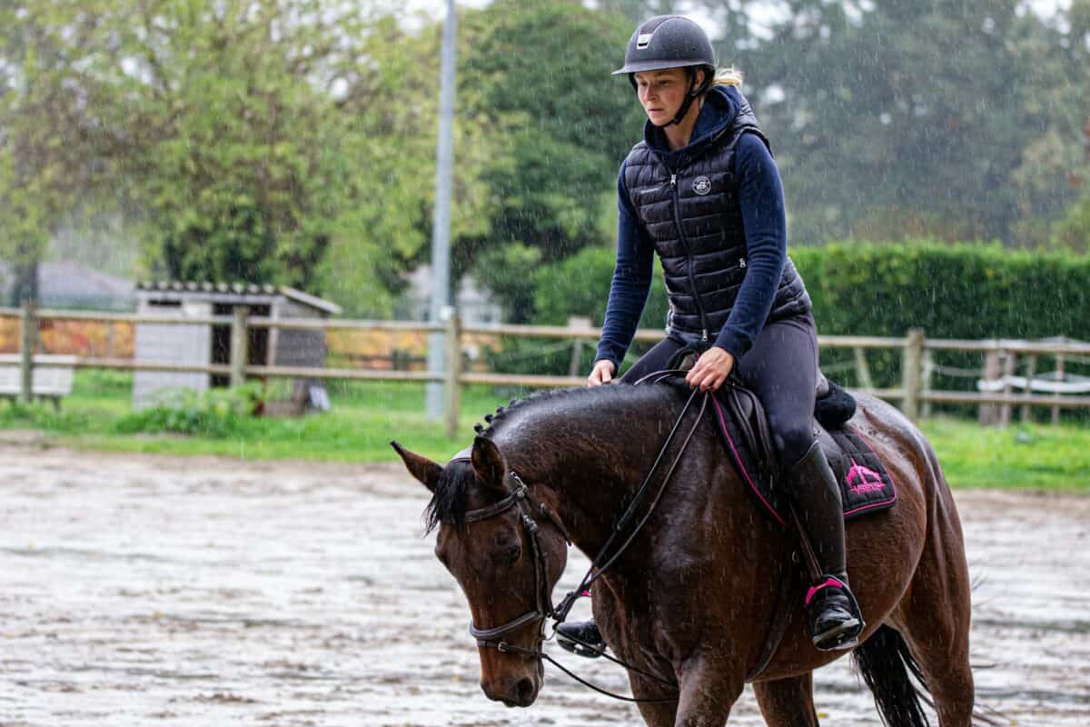 man riding horse during daytime
