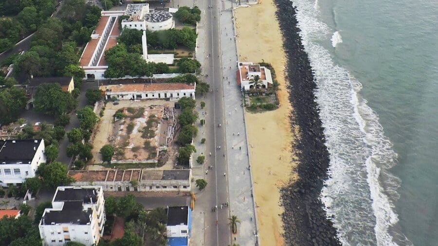 an aerial view of a beach and a city
