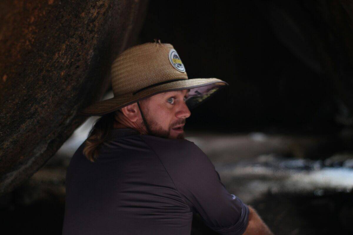 A forest ranger looking surprised.