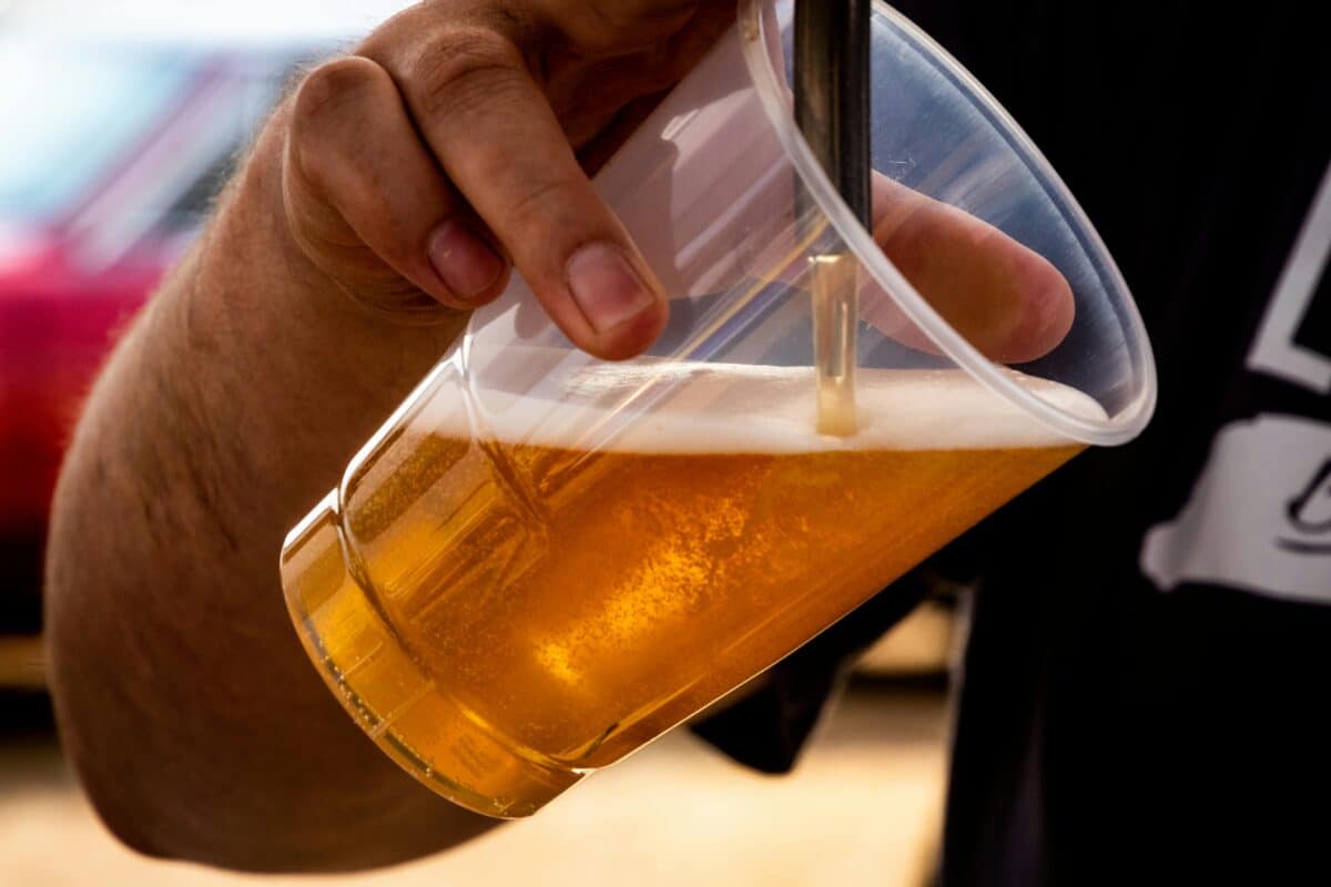 A man drinking a craft beer.