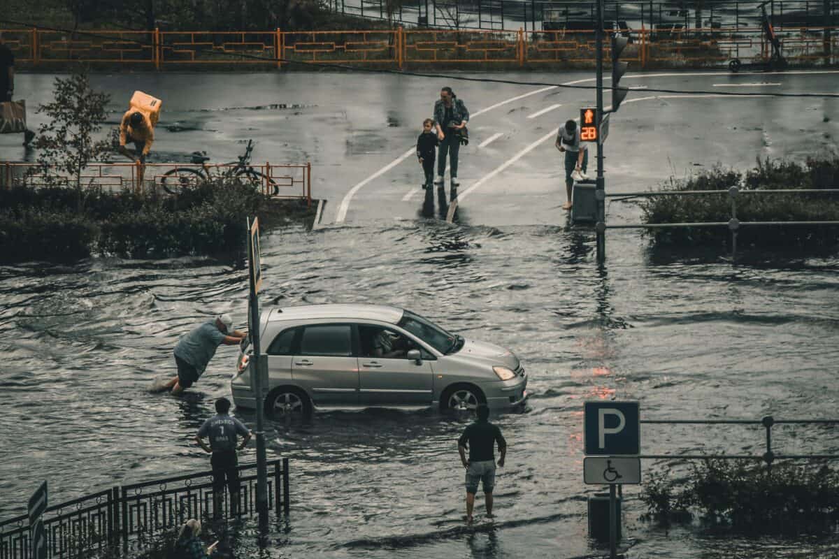 A busy road experiencing a flood.