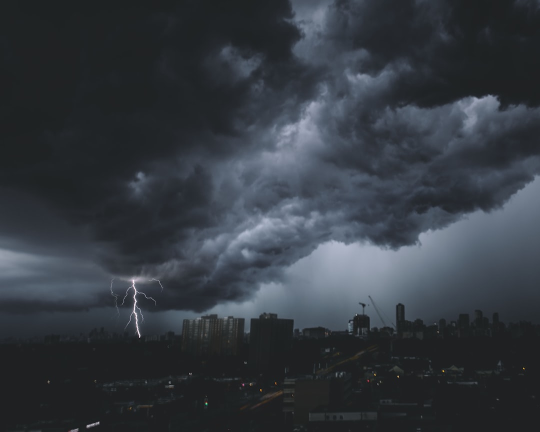 Waves of showers and storms around into next week