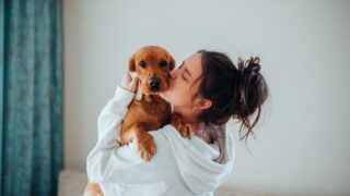 Why Dogs Lick Your Feet Before Bed (The Reason Will Break Your Heart)